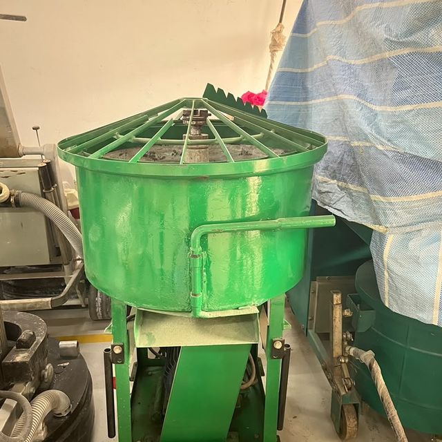 Green Mortar Mixer MM80 with an 80 litre drum and safety grille