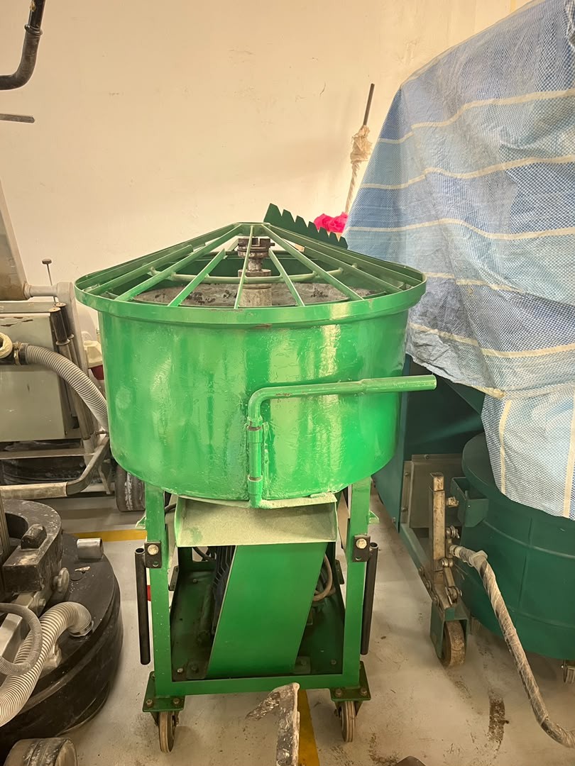 Green Mortar Mixer MM80 with an 80 litre drum and safety grille